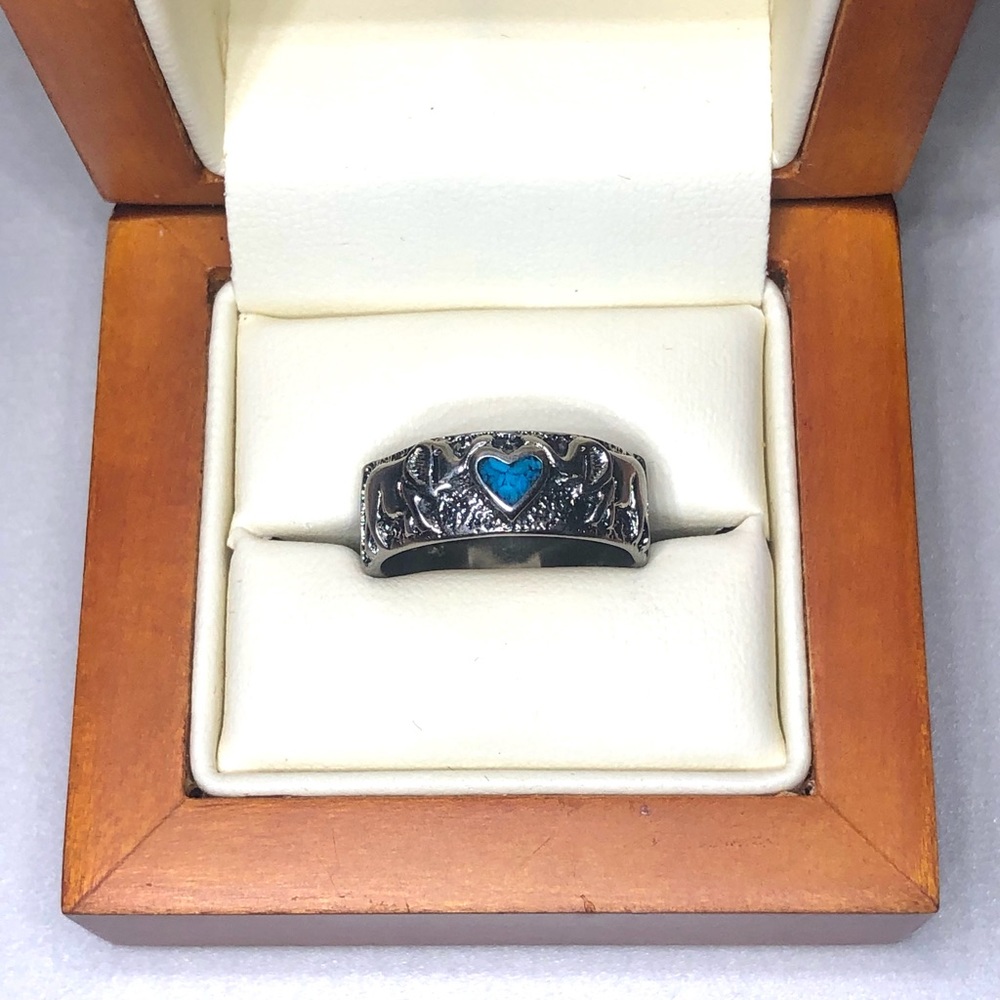 Elephants Holding Blue Heart Ring